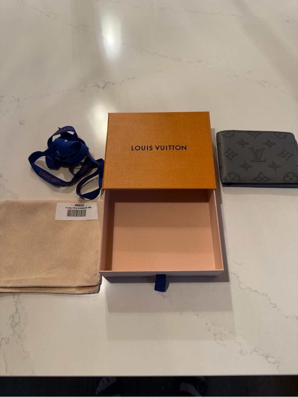 Louis Vuitton Gray Embossed Monogram Card Holder